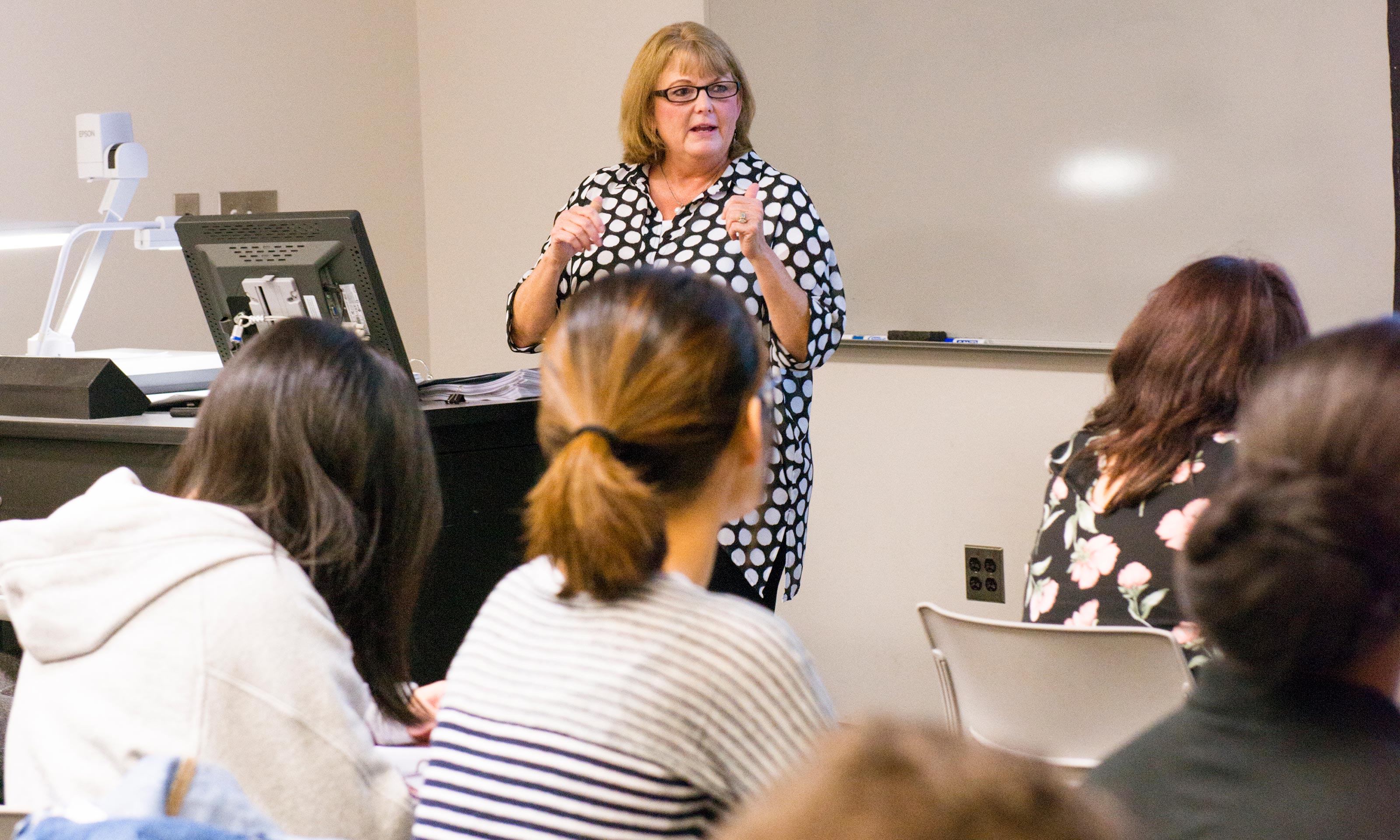 Oakland University professor Donna Free teaches a class