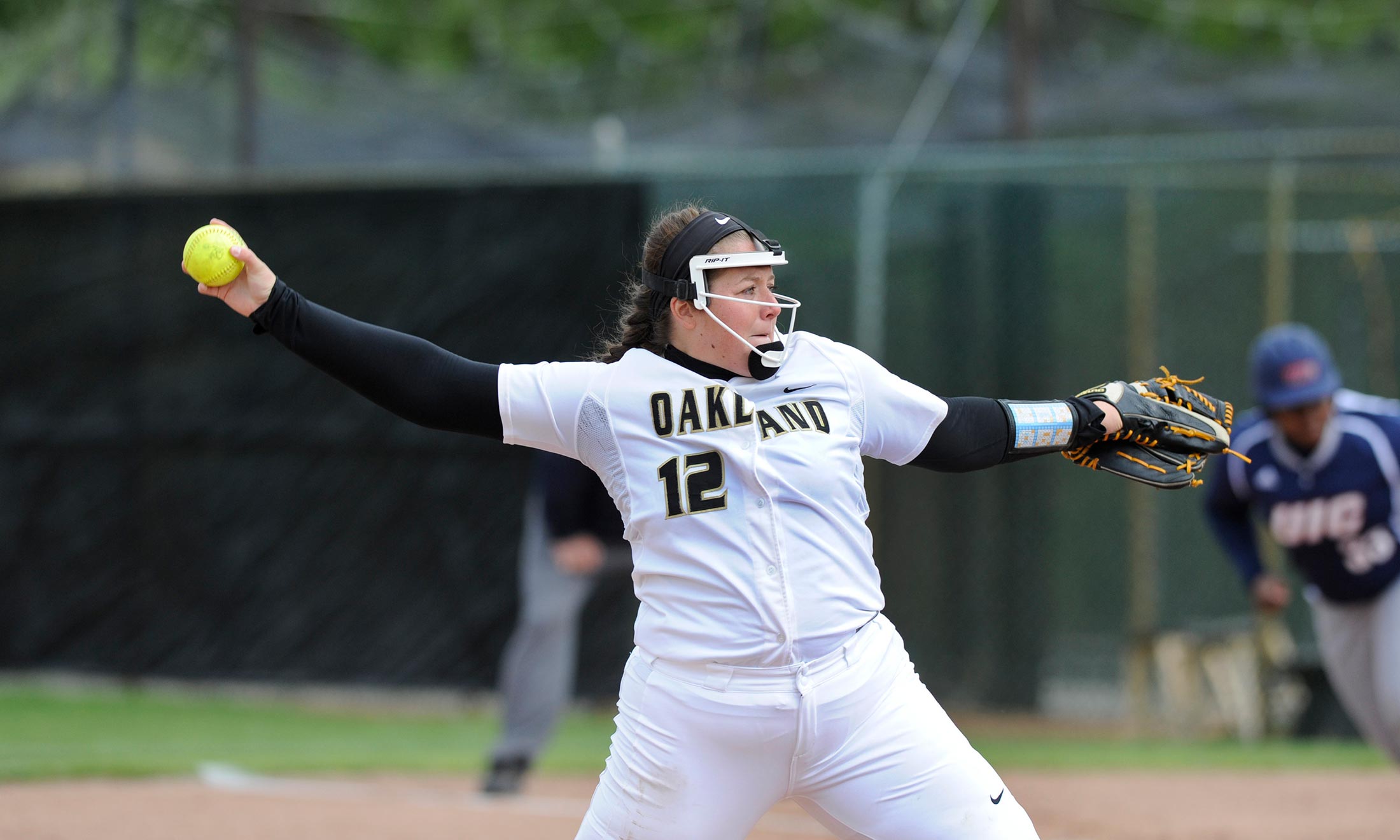 Oakland University softball star Erin Kownacki throws a pitch during a game