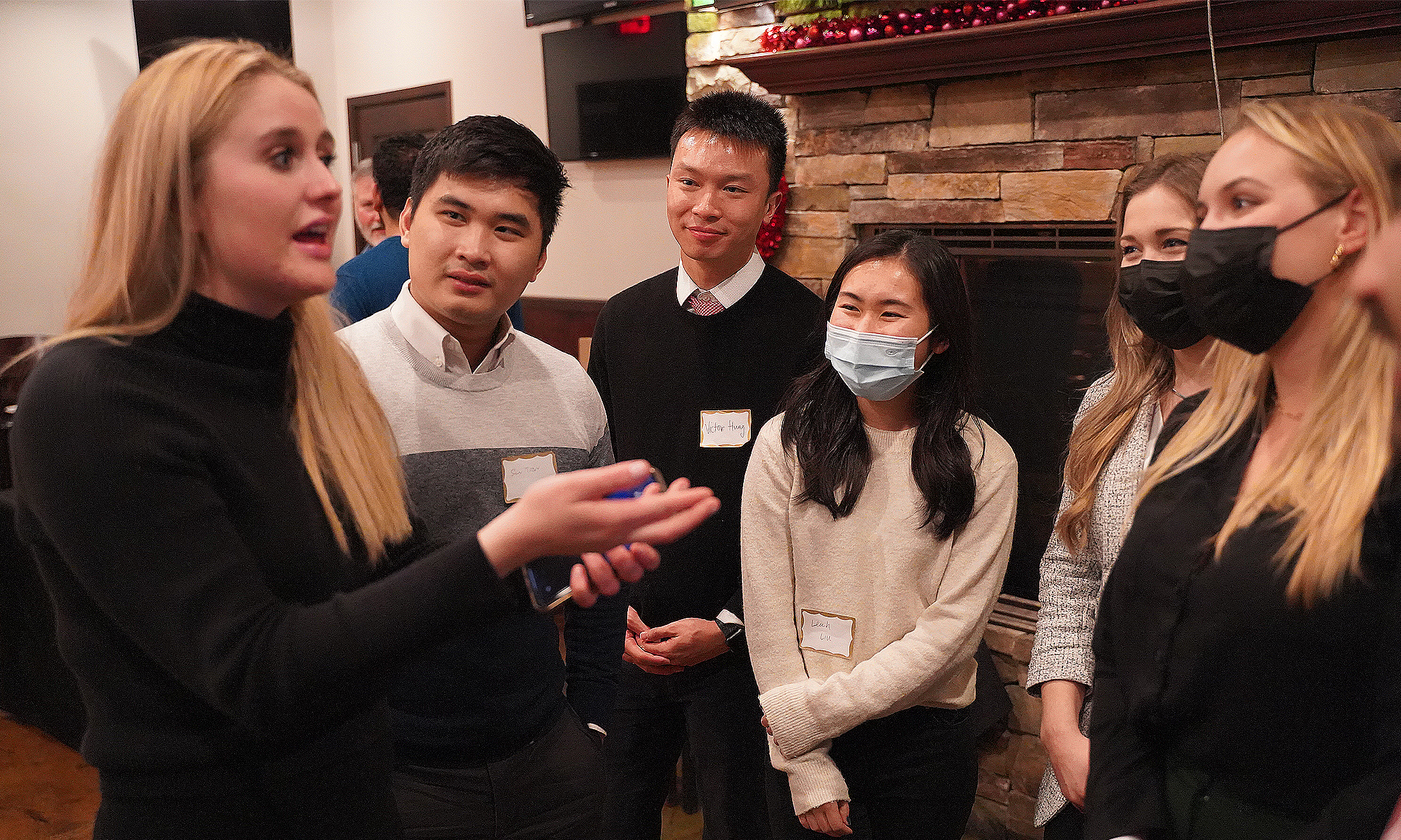 An image of a group of students talking after OUWB's first ortho research conference