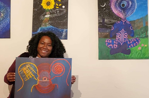 Monique Waltman and some of her art