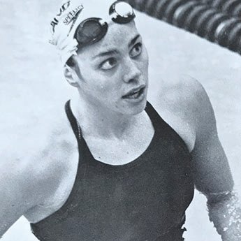 Historical photo of Nancy DeJonge on swim team
