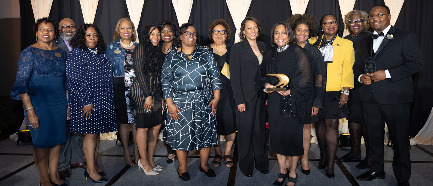 A group photo at a Black Alumni Chapter event