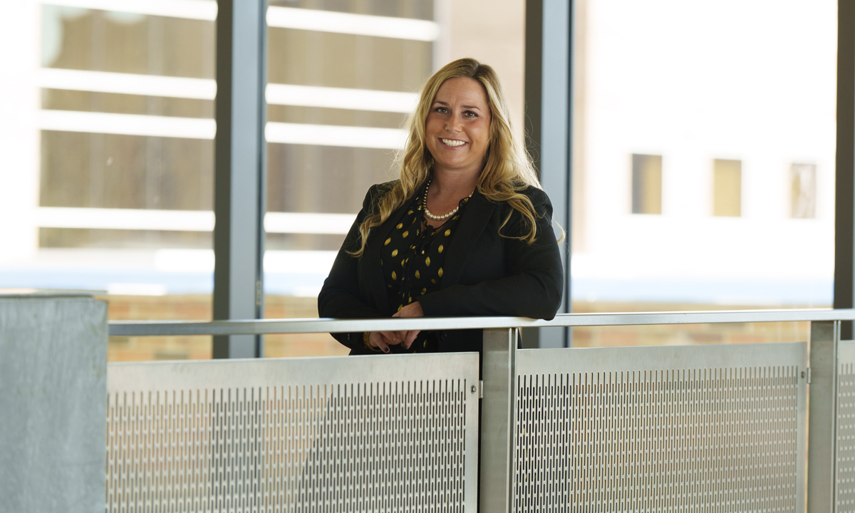 Woman standing in halllway