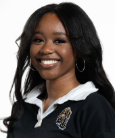 Geneece Davis smiling at the camera