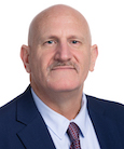 A headshot of Curt Whitsett