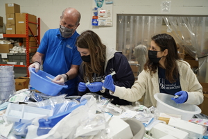 Students sorting items at World Medical Relief