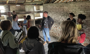The OUWB cohort in one of the dorms at Auschwitz-Birkenau in 2022