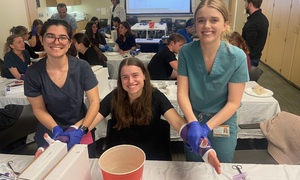 Students pose for a pic while practicing casting