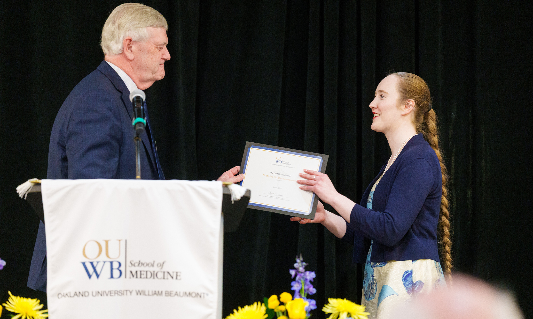 An image of a student receiving a certificate