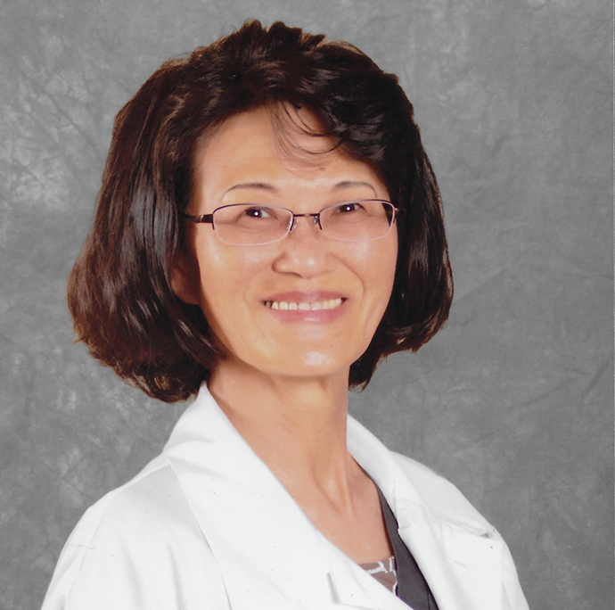 A professional headshot of Marie King