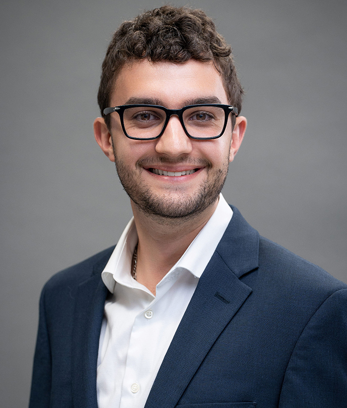 Professional headshot of Alex Hoffmann