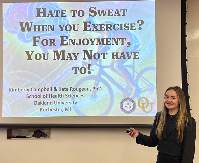 Kimberly Campbell with her research PowerPoint