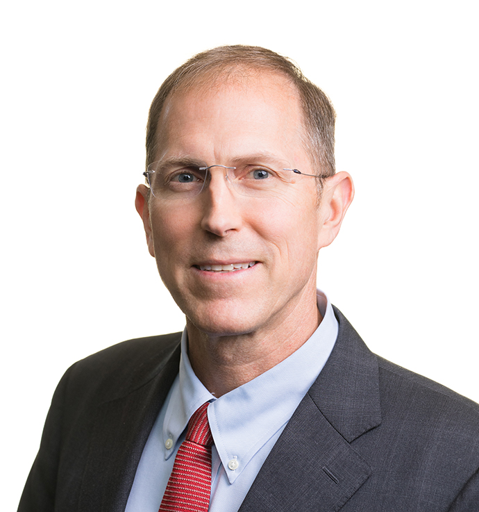 A headshot of Michael Jacobs