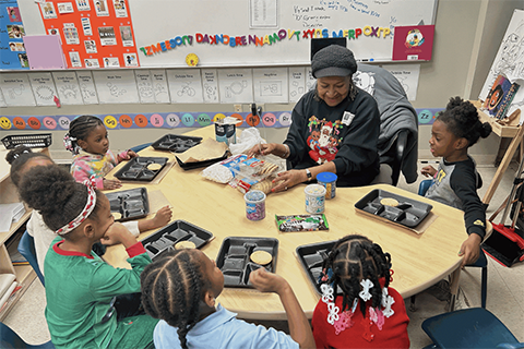 A teacher and students in a classroom at Caniff Liberty Academy
