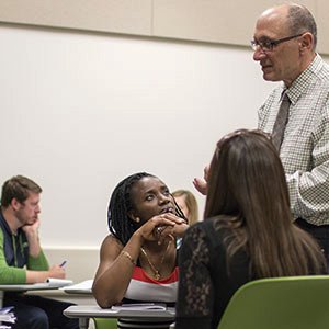Teacher adressing students in a classroom