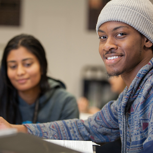 Students smiling into the camera