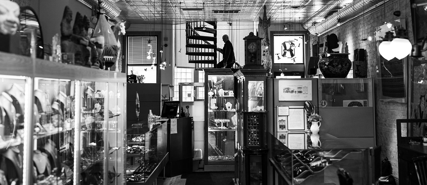 A black and white photo of Haig's store