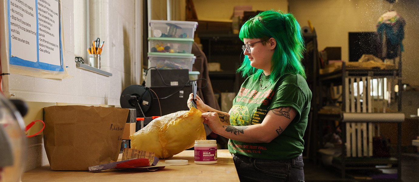 A person working on art