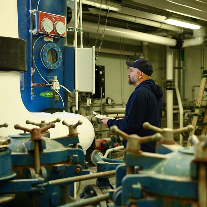 A man working in a water filtration center