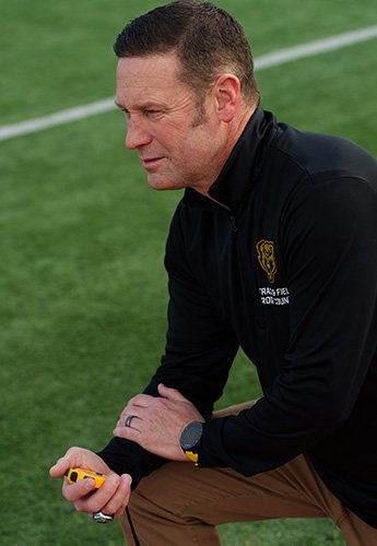 A man holding a stopwatch