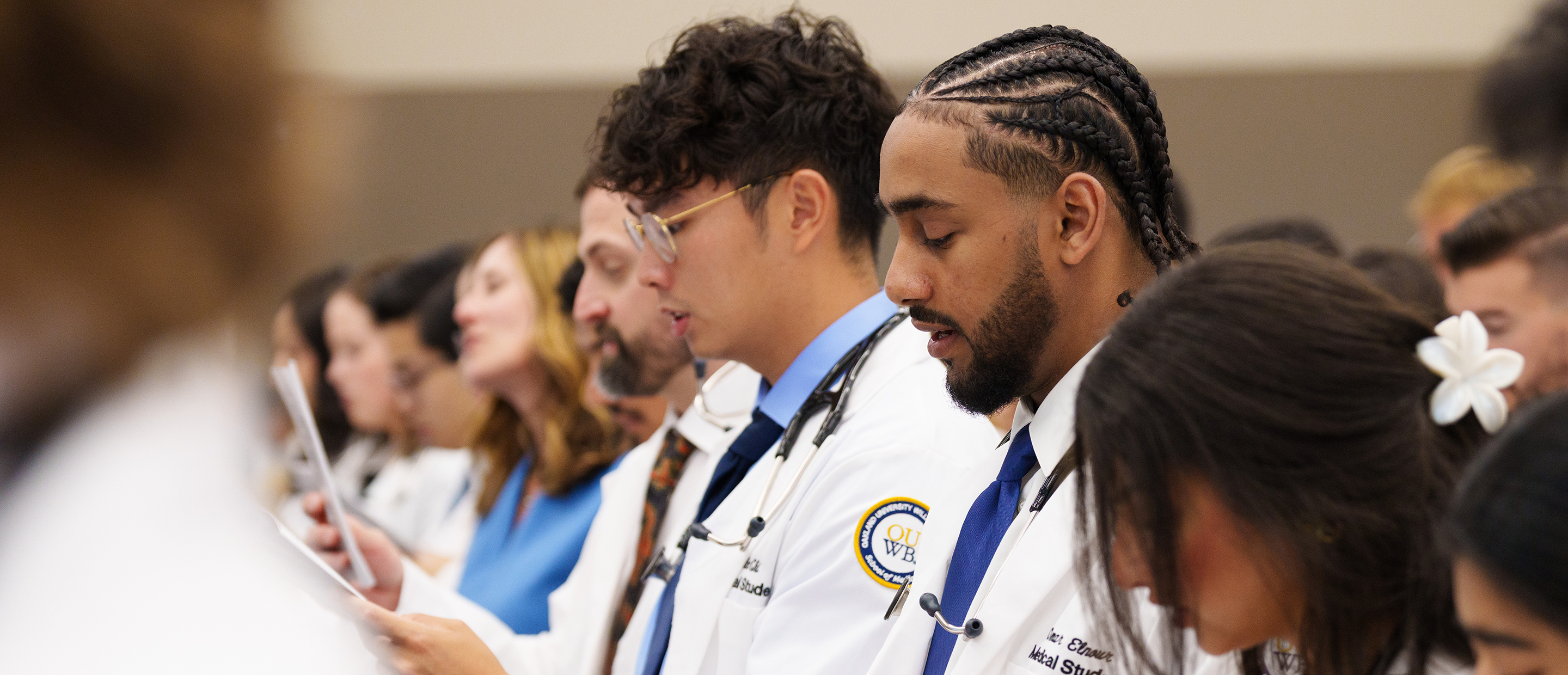 An image of OUWB students at white coat