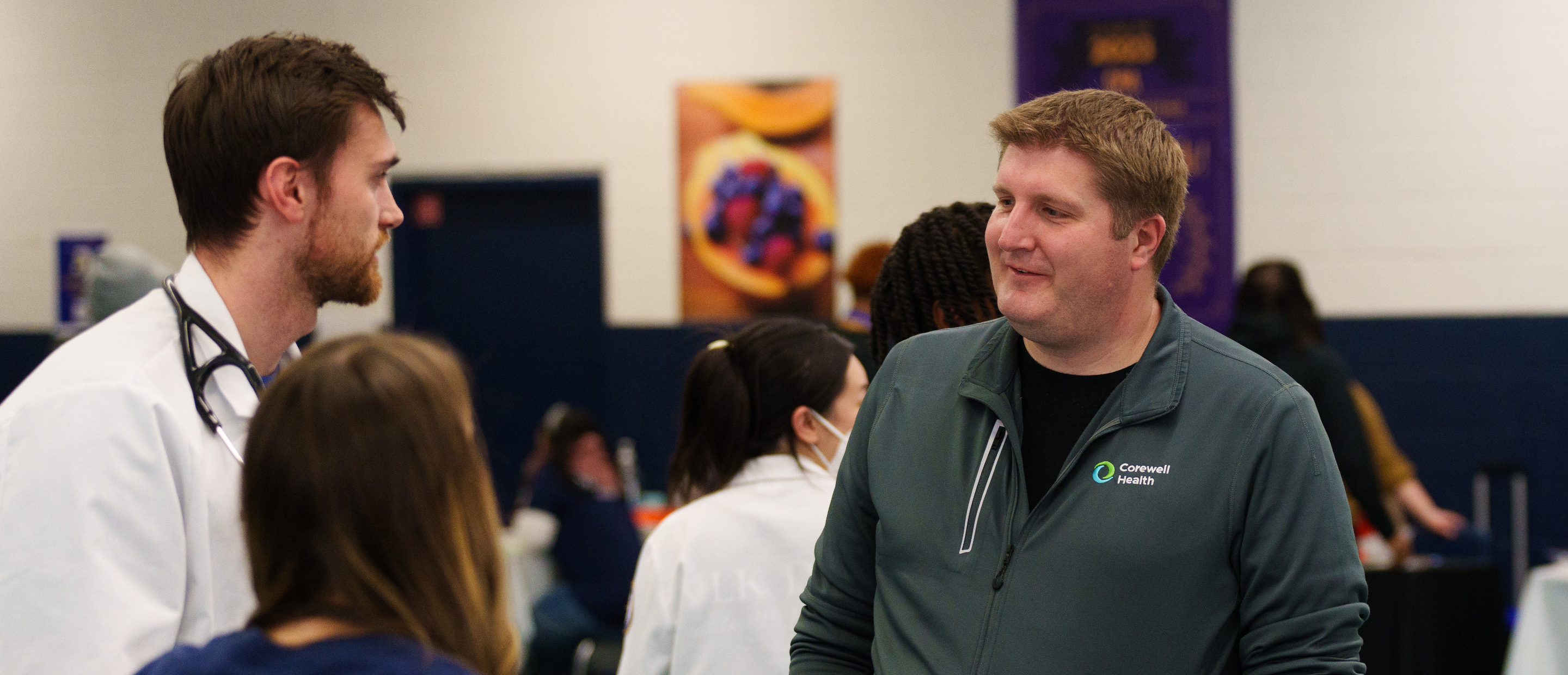 An image of Dr. Felice talking with students