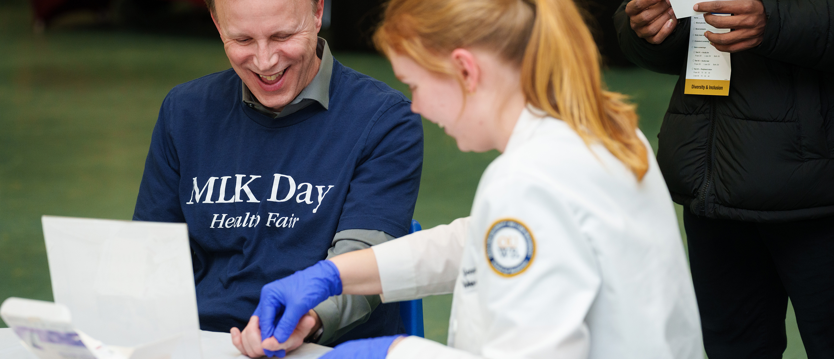 An image of Dean Carpenter and a student