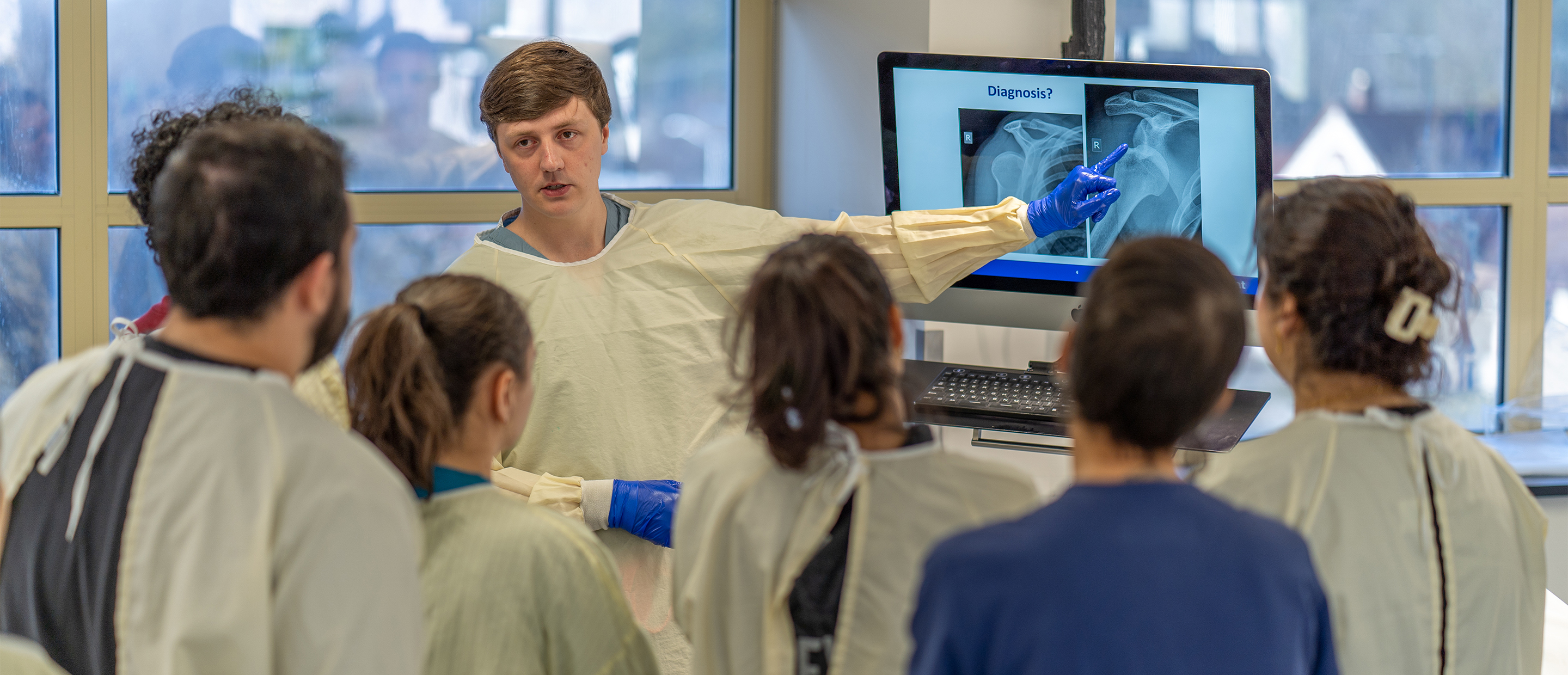 An image of Dean Carpenter and a student