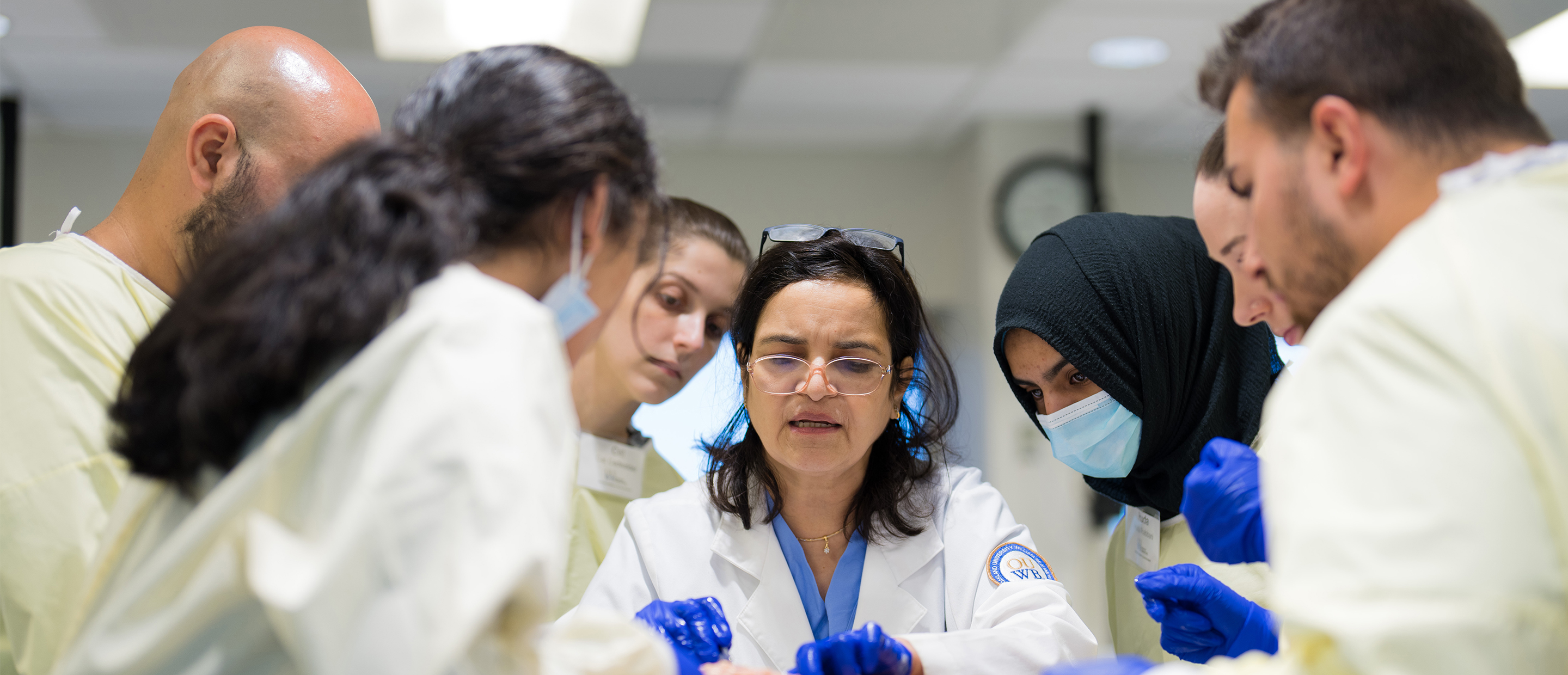An image of a faculty member teaching students