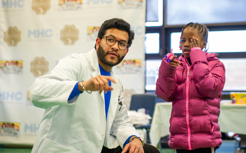 An image of a student with a patient