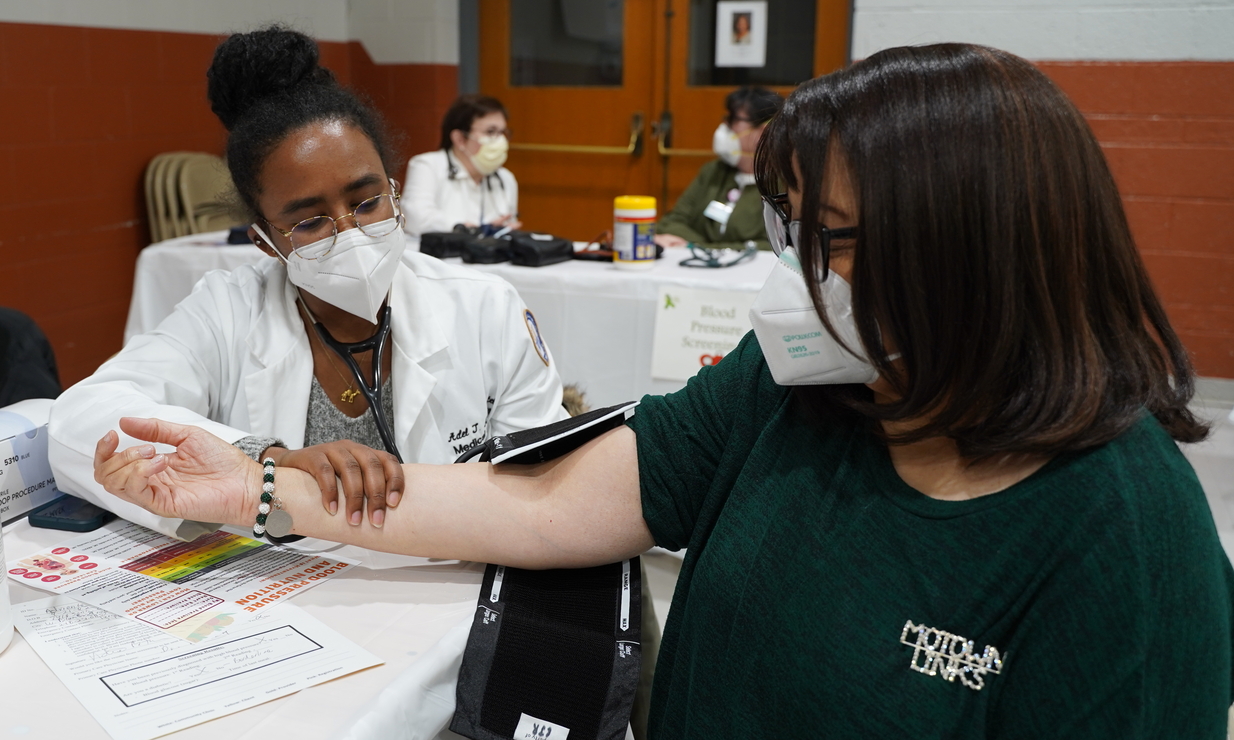 An image of a student with a patient