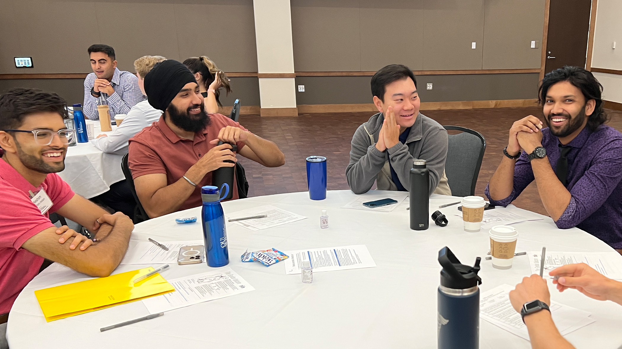An image of students sitting at a table