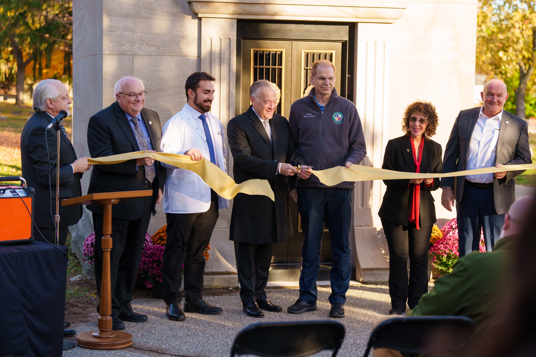 An image of officials cutting a ribbon