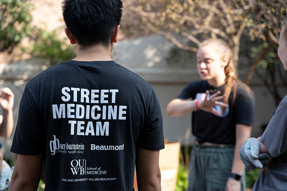 An image of a student wearing a Street Medicine shirt