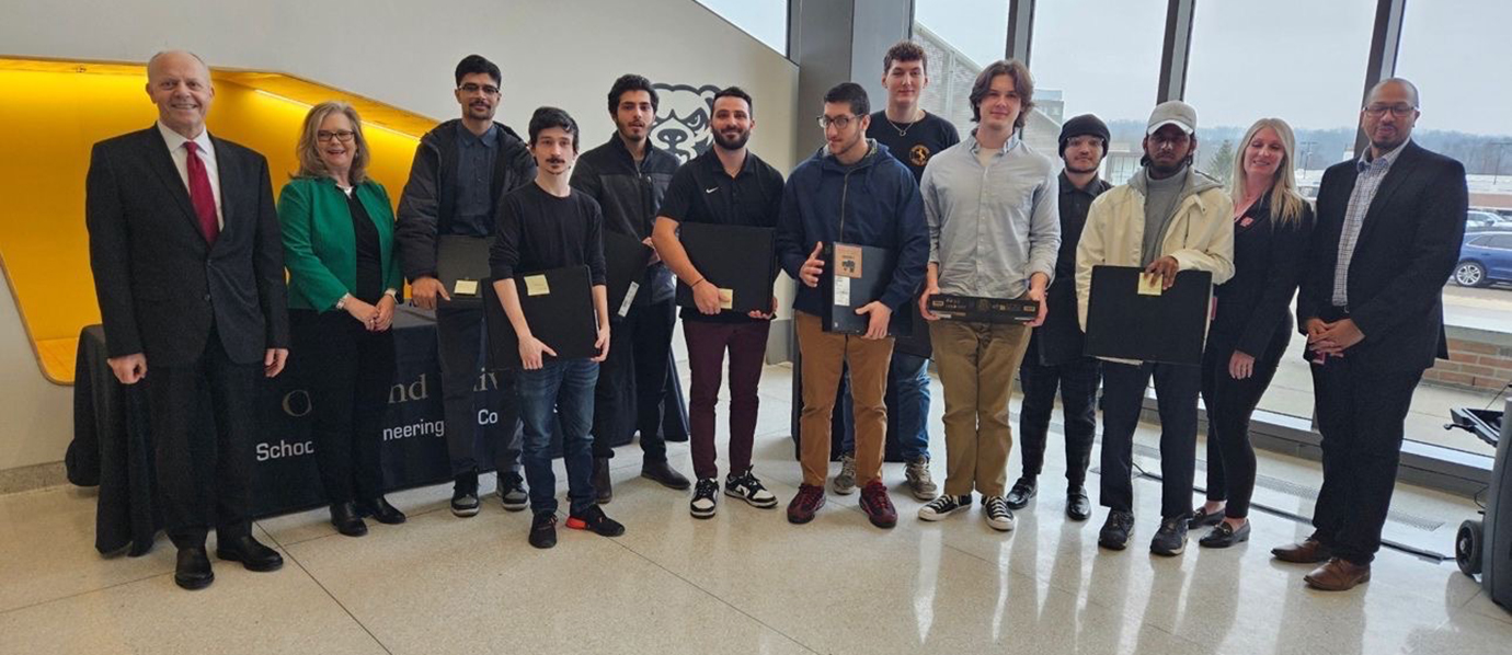 A group of people smiling